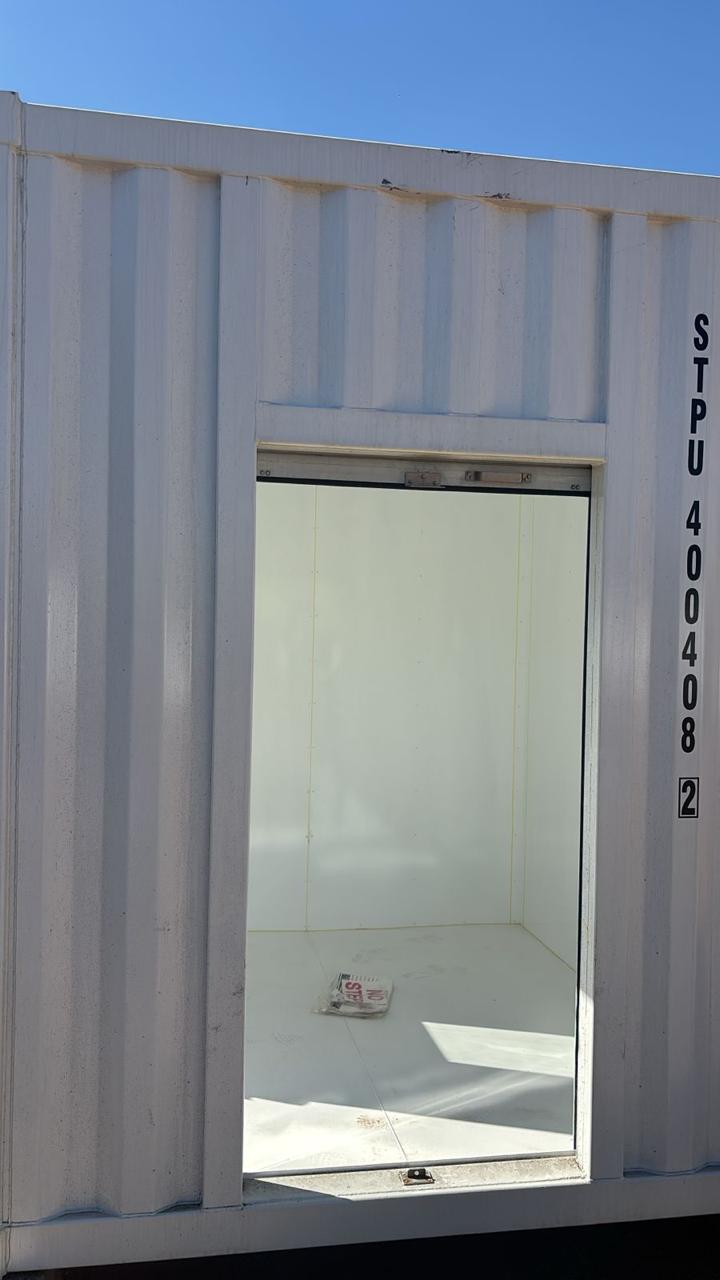 Cabin door with STPU container serial number visible
